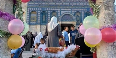بالصور كيف امضى اطفال القدس اليوم الاول لعيد الفطر المبارك
